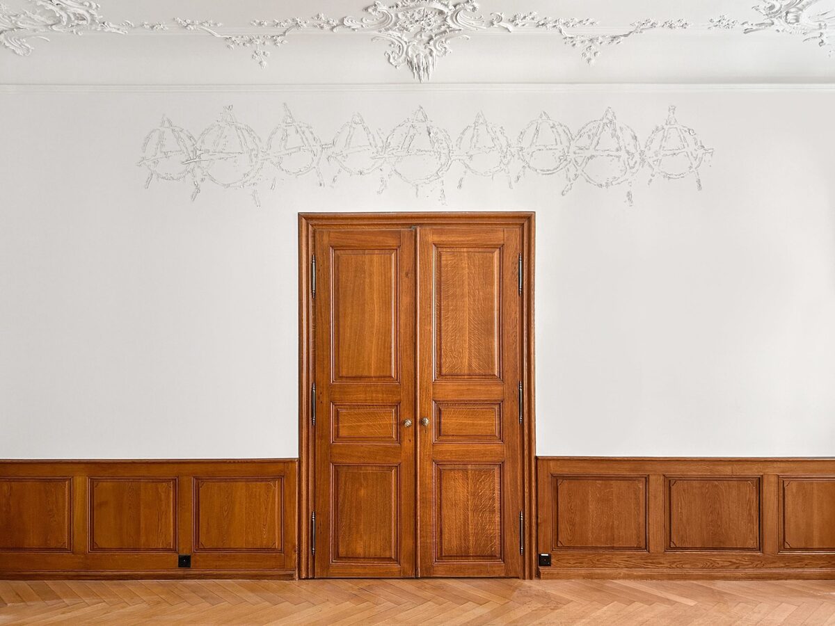 Eric Meier, *[Access All Areas (AAAAAAAAA)](\artworks\1b962549-5131-4880-b3d4-08de9250df87)* (2024), in situ wall engraving at [Basel Social Club](\institutions\3774eb6f-7d9c-413e-1714-08de93368f17), Basel, Switzerland