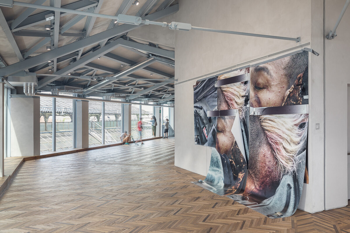 Satoshi Fujiwara, *[#R](\artworks\3934619f-e6c3-4ae0-ed21-08deaa787649)*, installation view in *[EU: Satoshi Fujiwara](\exhibitions\23fa4921-3a87-4c8f-0ca4-08dea67600b7)*, [Fondazione Prada Osservatorio](\institutions\c1319fcb-c079-454f-0e5a-08dd49f63f97), Milan, 2017. Curated by [Luigi Alberto Cippini](\people\6af7d844-eec2-4fd3-916e-23f8e9fccd01).